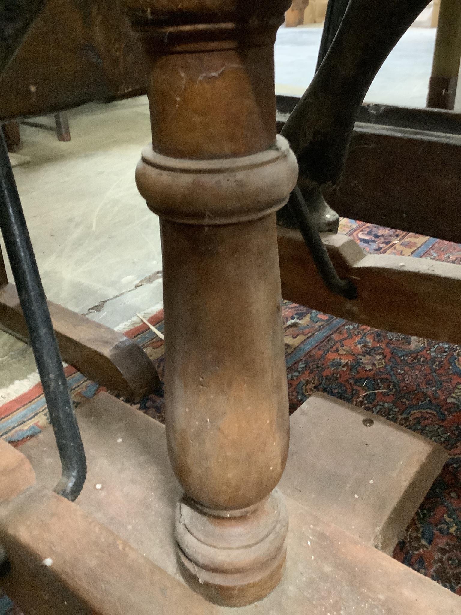 A large Edwardian Ayres type rocking horse on a turned safety frame, length 160cm, height 110cm